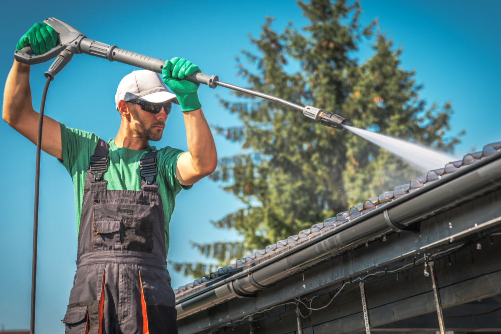 Roof and gutter cleaning on a commercial building