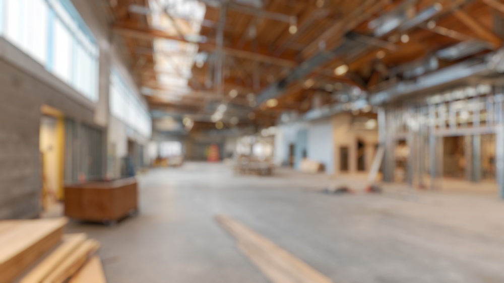 Bespoke building manager on site coordinating trades and compliance